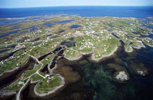 flyfoto av nord-norge, nordland, lofoten, røst, fiskevær, lofotfiske